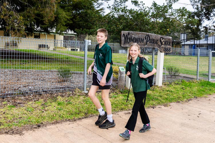2 students walking to school